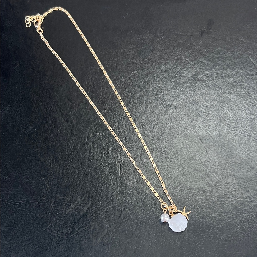 Francesca's Collections Gold Shell and Pearl Charm Necklace